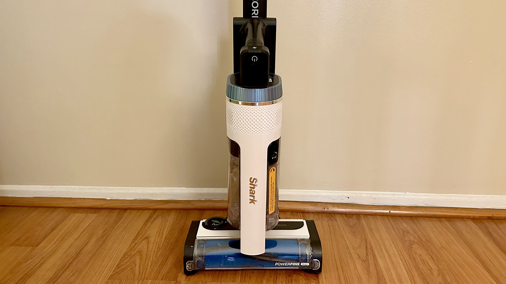 Shark Cordless Pro vacuum stored on its wand