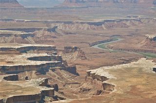 Canyonlands are deeply eroded landscapes made up of steep walled valleys with small valley floors and extensive outcropping of bedrock formed into cliffs, ledges or steep slopes