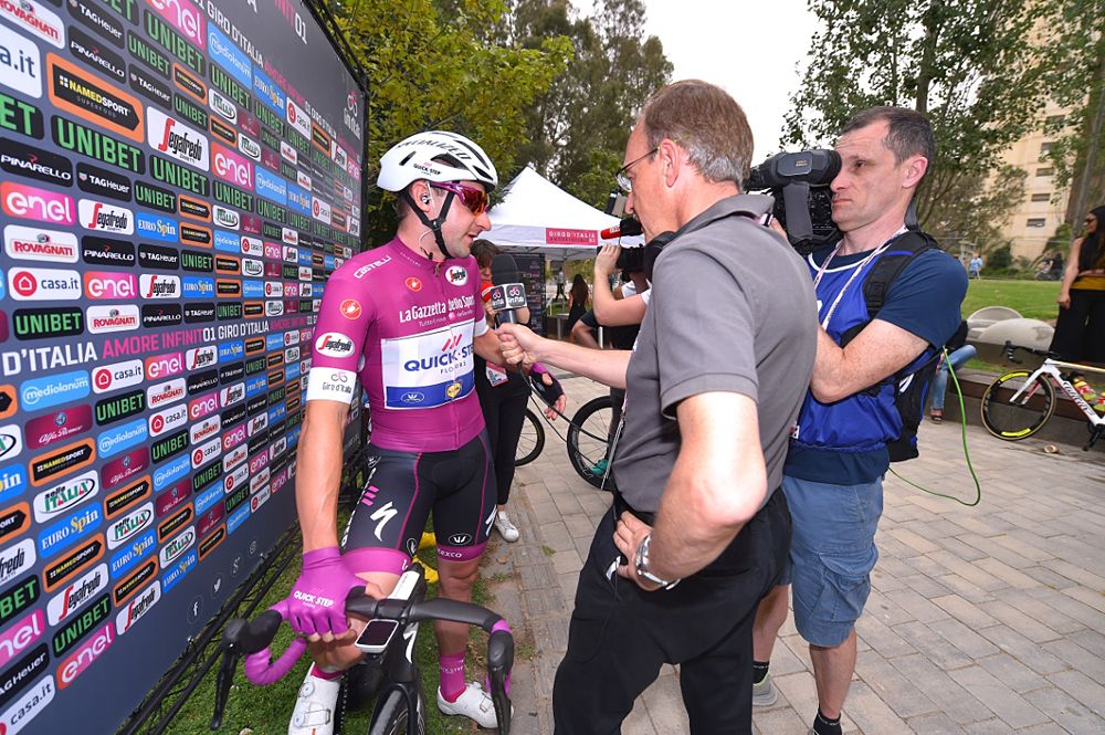 Points leader and stage 2 winner Elia Viviani speaks to the press ahead of stage 3 at the Giro d'Italia