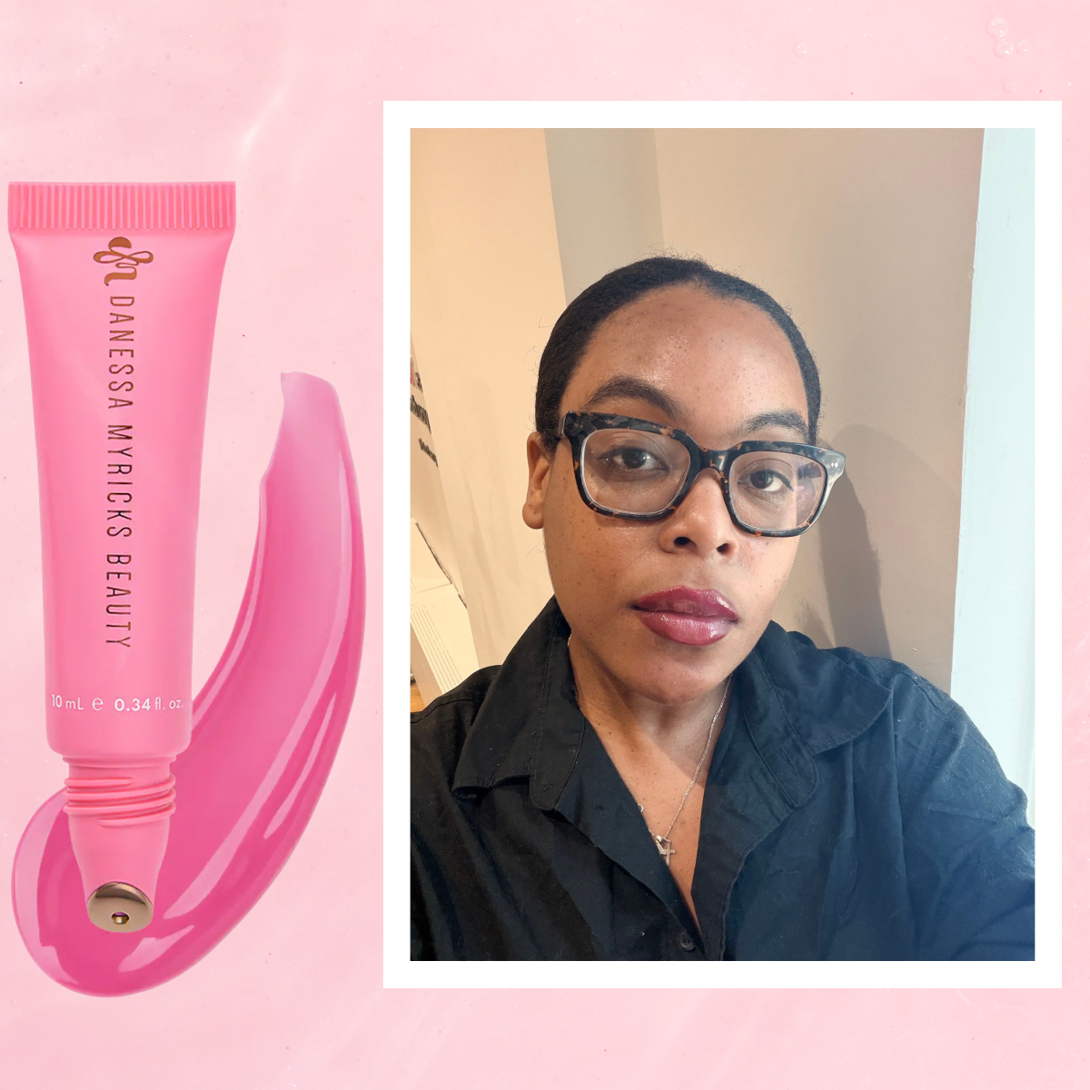A woman wearing a black button up with pink glossy lips. She is next to a tube of lip gloss. 