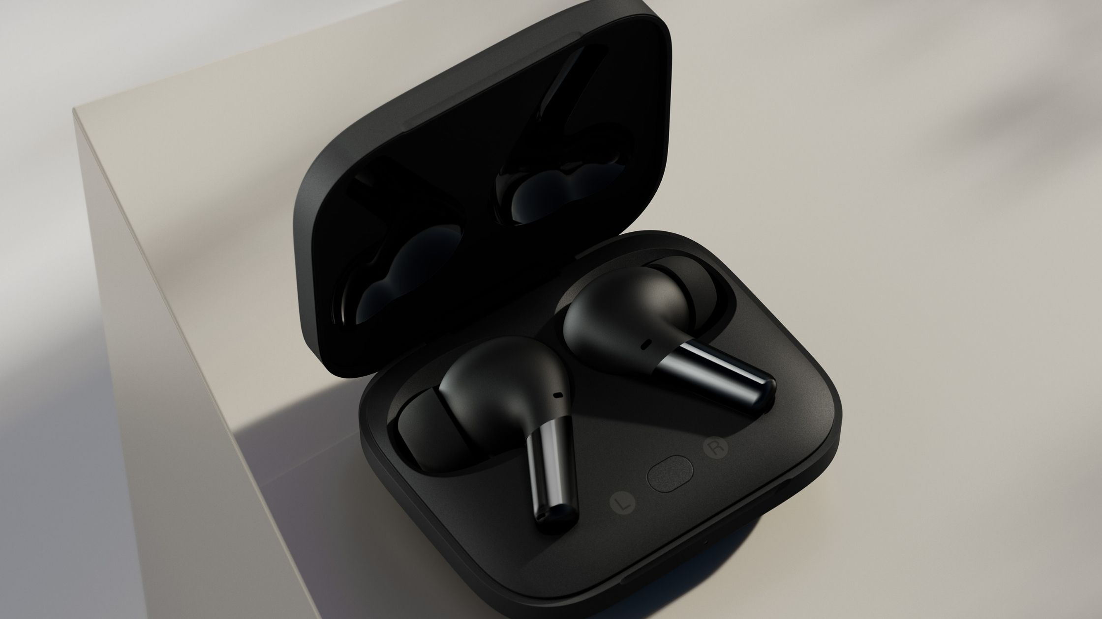 the OnePlus Buds Pro wireless earbuds in their charging case