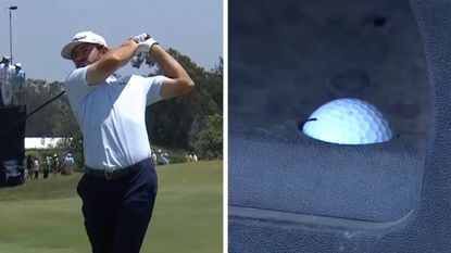 Cameron Young hits a tee shot whilst his golf ball finishes in a golf cart golf ball holder