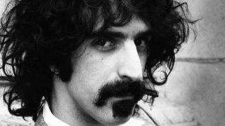 A close up of Frank Zappa’s face