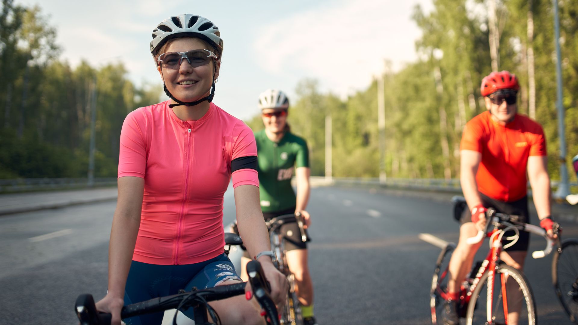 Women riding bikes together in a group