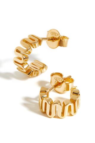 wavy gold huggies best gold earrings