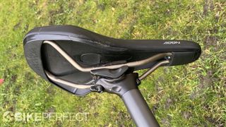 The underneath of the Fizik Terra Aidon X3 e-bike saddle showing the design of the rails