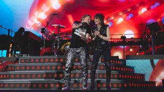 Axl Rose and Chrissie Hynde onstage
