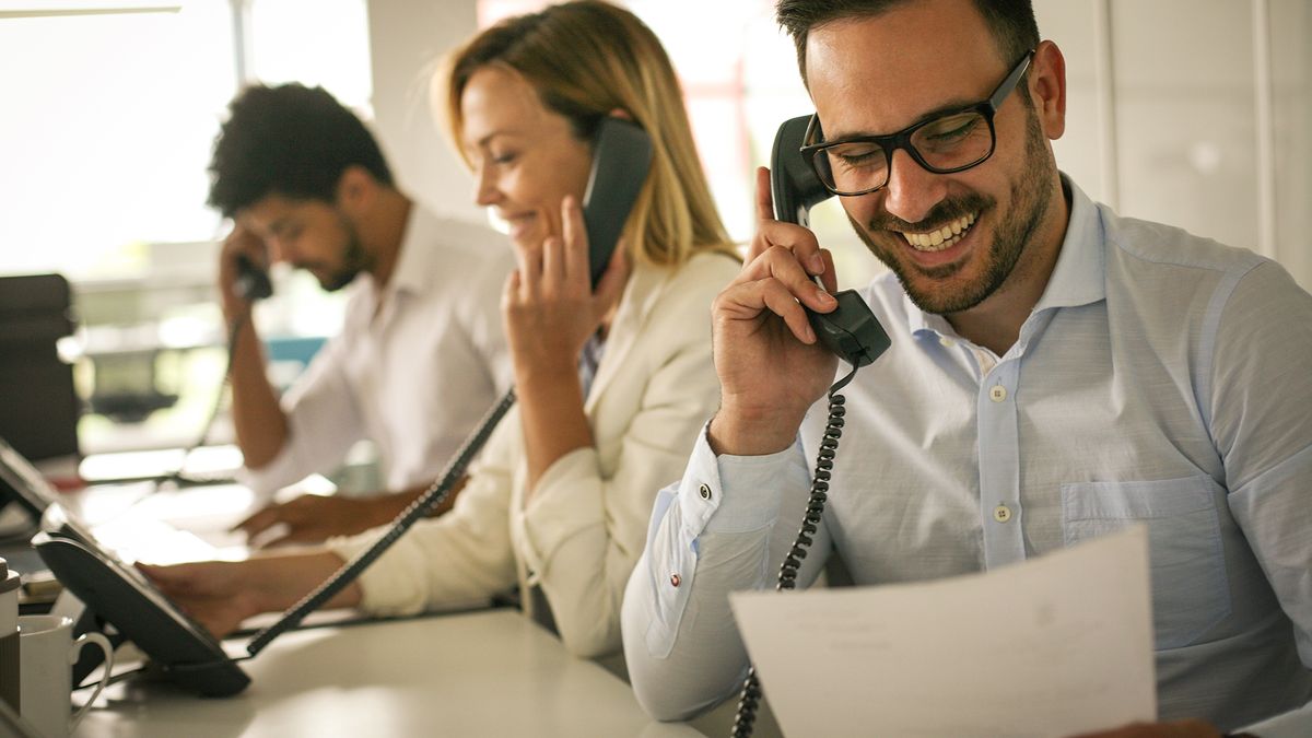 A person making a sales call in an office.