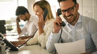 A person making a sales call in an office.