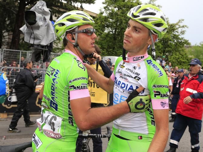 Sonny Colbrelli, left, consoles Bardiani Valvole-CSF Inox teammate Marco Canola at the finish in Matera