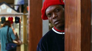 Samuel L. Jackson looking around a corner in Jackie Brown