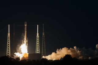 A SpaceX Falcon 9 v1.1 rocket launches the SES-8 commercial communications satellite into orbit from Cape Canaveral Air Force Station in Florida on Dec. 3, 2013. The mission is SpaceX's first commercial satellite launch into a geostationary transfer orbit. This photo was released Nov. 28, 2013.