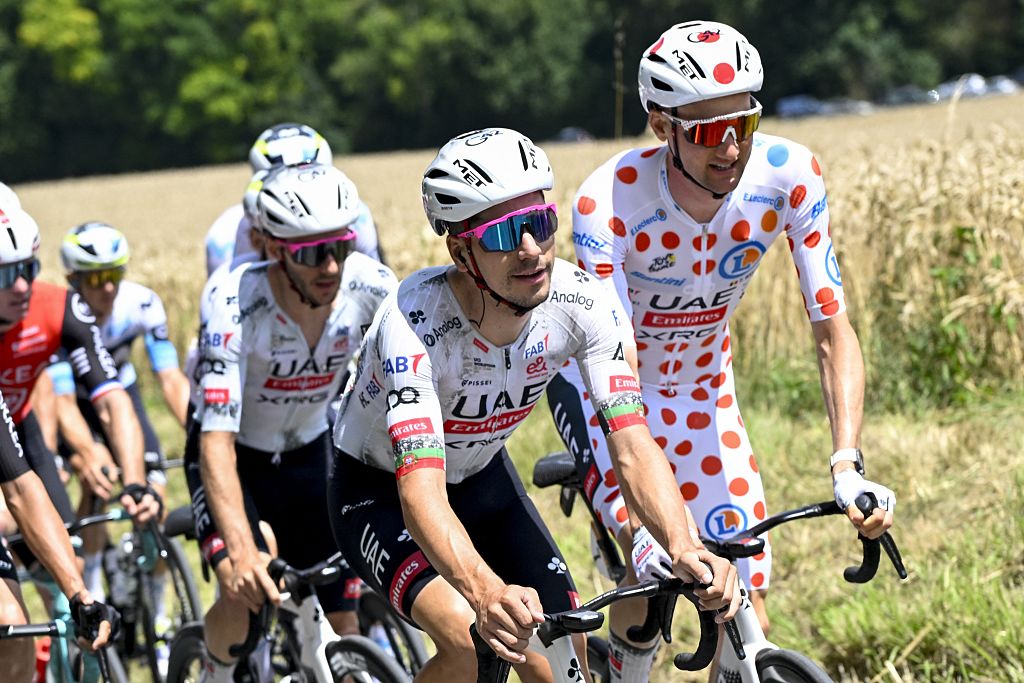 Portuguese Joao Almeida of UAE Team Emirates and Belgian Tim Wellens of UAE Team Emirates wearing the red polka-dot jersey pictured in action during the fourth stage of the 2025 Tour de France cycling, Amien Metropole - Rouen (173 km), on Tuesday 08 July 2025 in France. The 112th edition of the Tour de France starts on Saturday 5 July in Lille, France, and will finish in Paris, France on the 27th of July. BELGA PHOTO POOL JAN DE MEULENEIR (Photo by POOL JAN DE MEULENEIR / BELGA MAG / Belga via AFP)