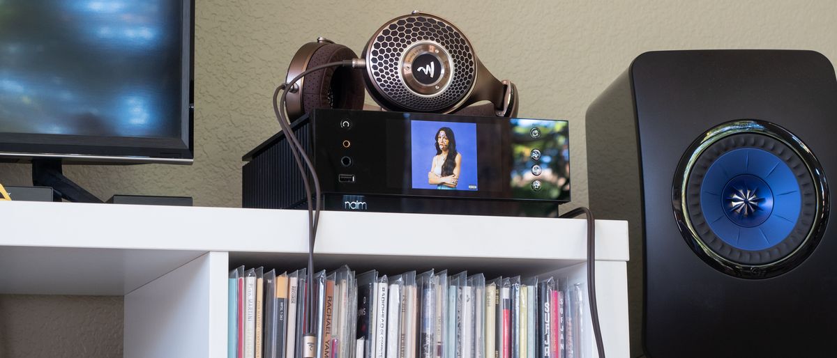 Pictured: Naim Uniti Atom Headphone Edition on a shelf.