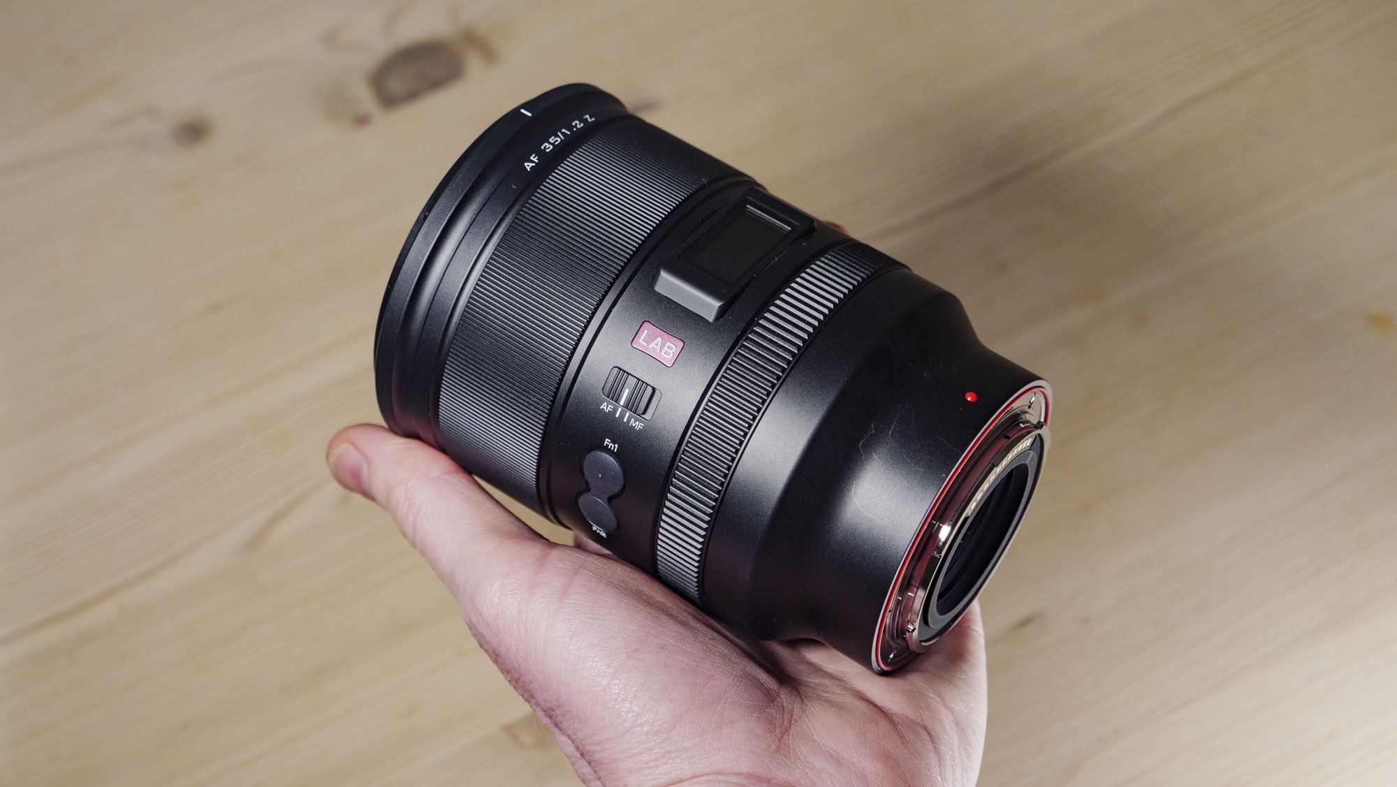 Viltrox AF 35mm F1.2 LAB Z lens for Nikon, in photographer's hand
