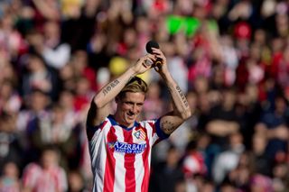 Fernando Torres applauds the fans at his presentation as an Atletico Madrid player in January 2015.