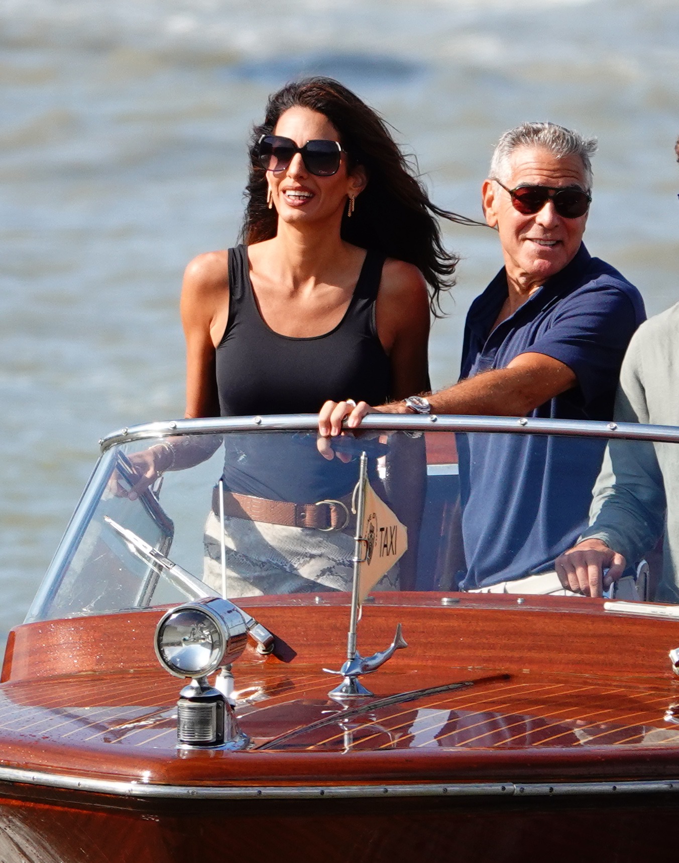 Amal Clooney Takes the Editor-Beloved Wedge Trend and a Sheer Snakeskin Skirt to Venice Film Festival