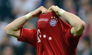 Bastian Schweinsteiger holds his head after missing a penalty against Chelsea in the Champions League final shootout in 2012.