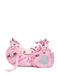 Balenciaga Le Cagole XS bag, now £1,164 (was £1,790) | FARFETCH