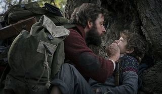 A Quiet Place John Krasinski silencing his son in the woods
