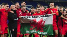 Gareth Bale and his Wales team-mates celebrate with ‘that flag’ 