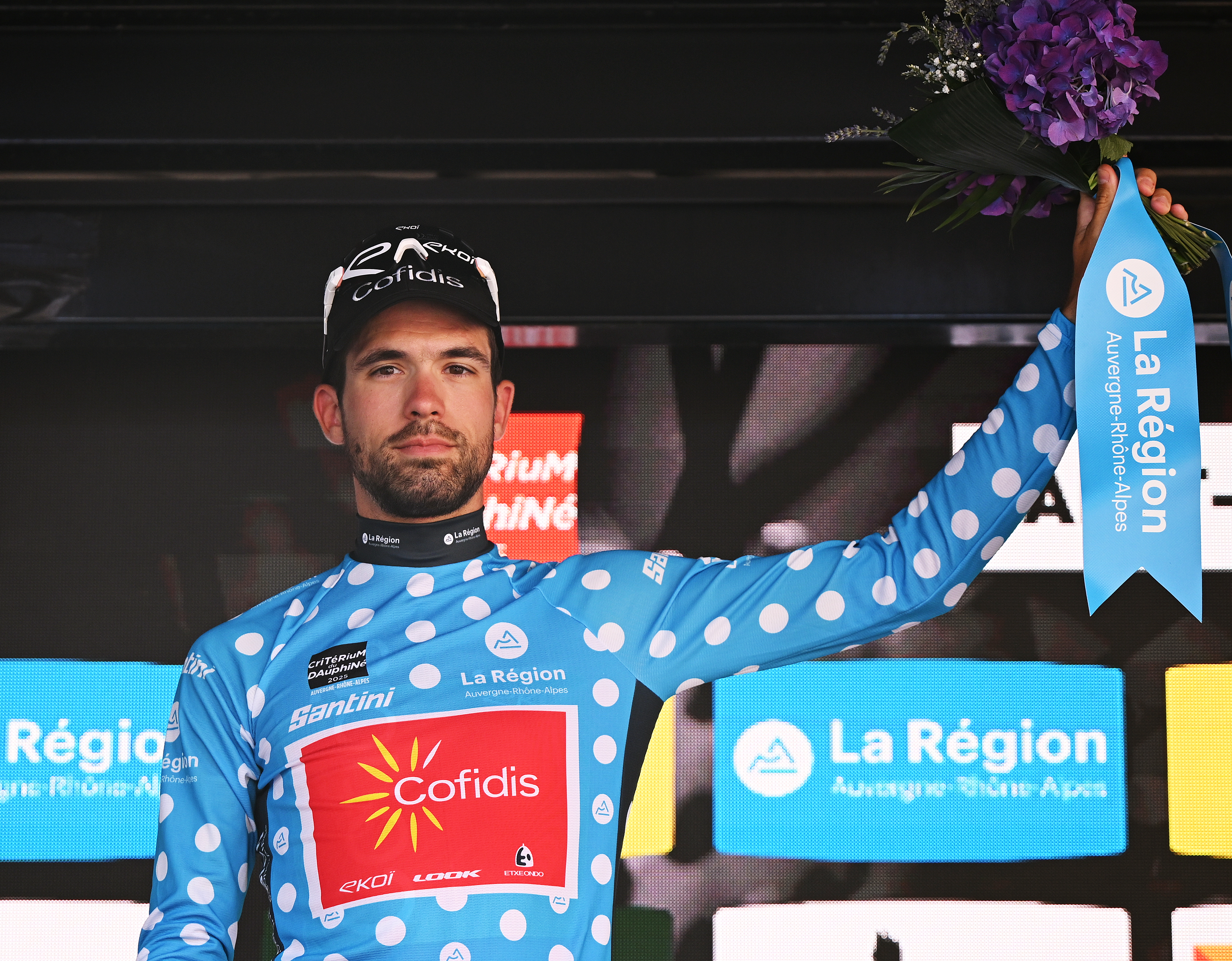 SAINT-PERAY, FRANCE - JUNE 10: Paul Ourselin of France and Team Cofidis celebrates at podium as Polka dot Mountain Jersey winner during the 77th Criterium du Dauphine 2025, Stage 4 a 17.4km individual time trial stage from Charmes-sur-Rhone to Saint-Peray / #UCIWT / on June 10, 2025 in Saint-Peray, France. (Photo by Dario Belingheri/Getty Images)