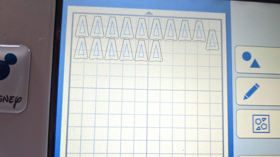 Shapes arrange themselves on an LCD screen