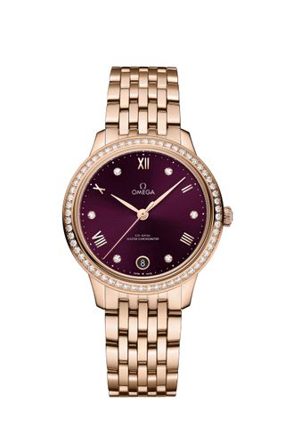 Rose Gold DE VILLE PRESTIGE Omega watch with a burgundy face and diamond bezel.