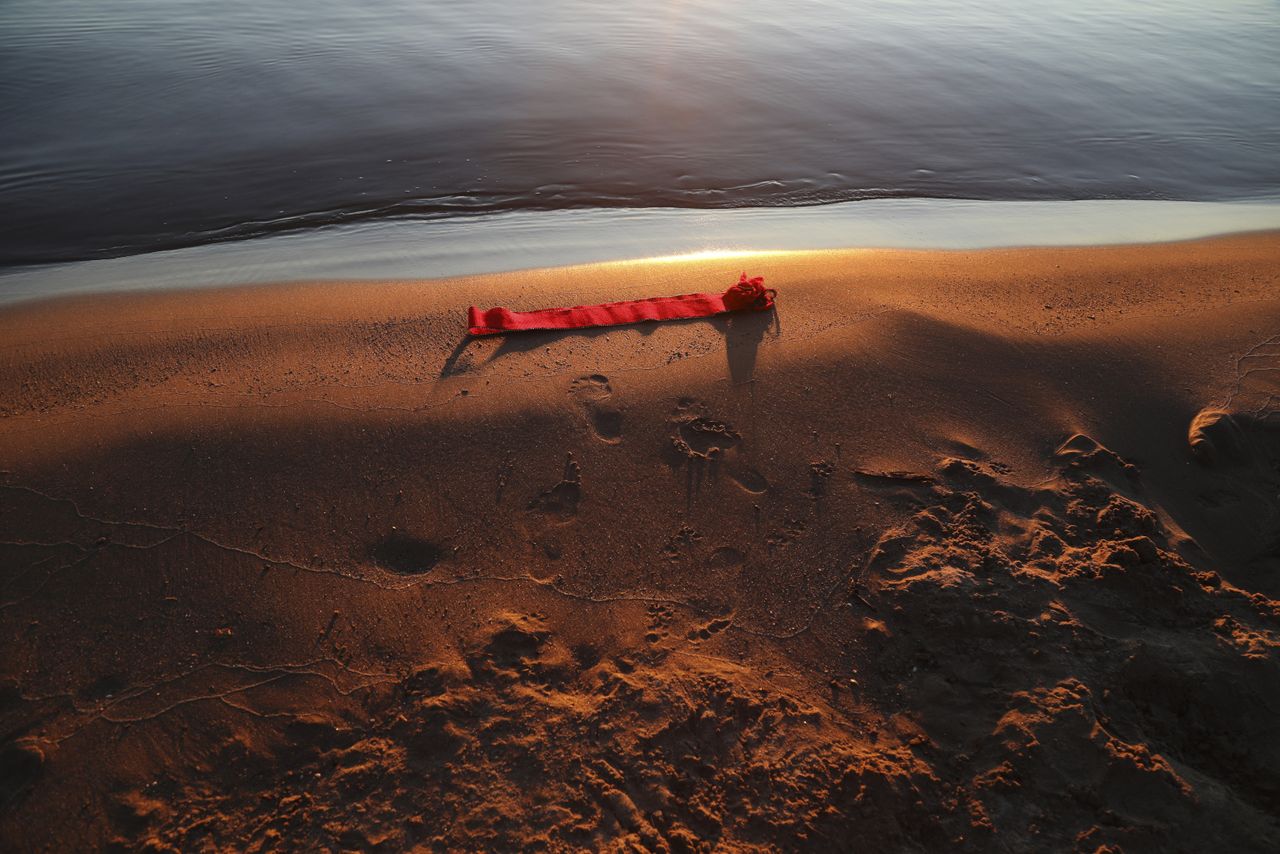 Woven belt on shore, image from Leica Women Foto Project Award 2023