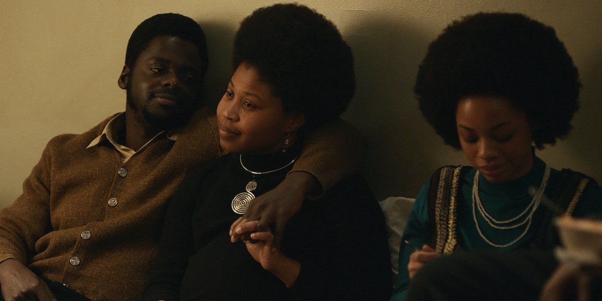 Daniel Kaluuya as Fred Hampton cuddles Dominique Fishback as Deborah Johnson in Judas and the Black Messiah