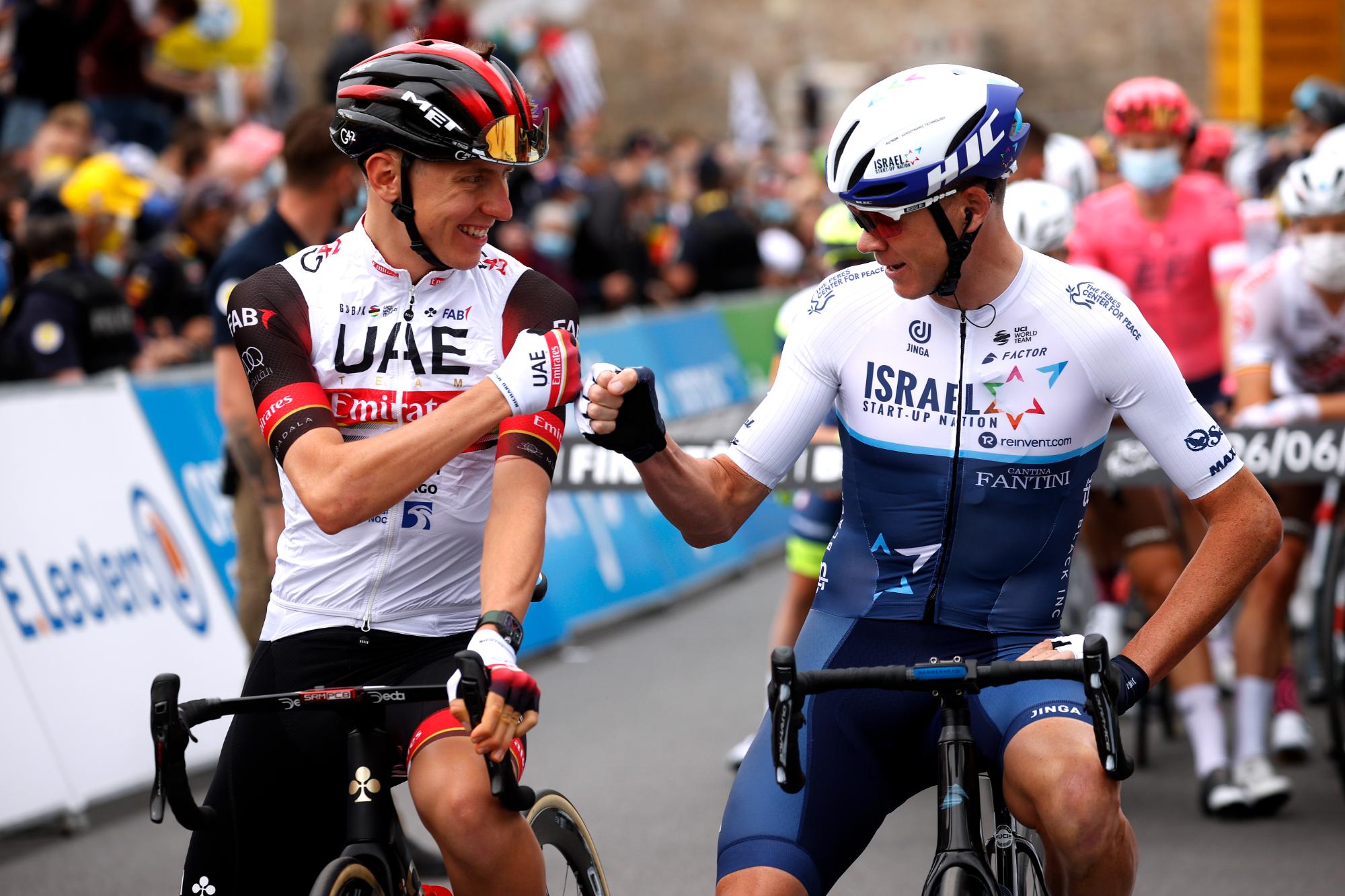 Tadej Poga&amp;#269;ar (UAE-Team Emirates) &amp;amp; Chris Froome (Israel Start-Up Nation) during the 2021 Tour de France in Landerneau, France. (Photo by Chris Graythen/Getty Images)