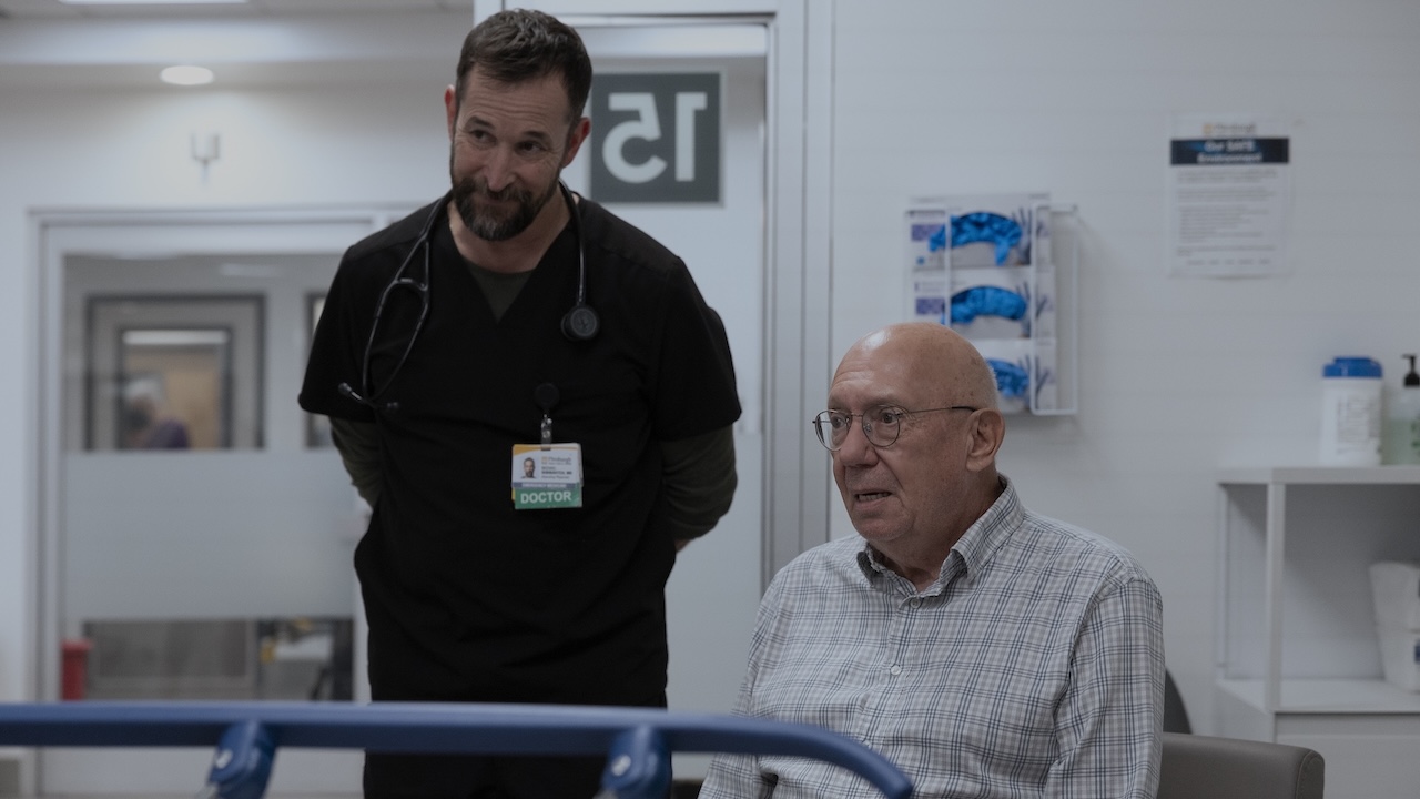 Noah Wyle as Robby and Dann Florek as a patient's husband in The Pitt Season 2x12