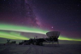 The aurore australis over the Dark Sector at Amundsen-Scott South Pole Station. The Dark Sector is so-named due to the absence of light and radio wave interfence. The bright spot above the ground shield in the foreground is Jupiter. The white streaks of light going up are the Milky Way.