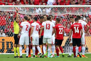 Albania's Lorik Cana is sent off against Switzerland at Euro 2016.