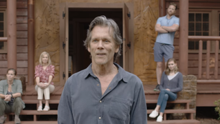 Kevin Bacon smiling in They/Them
