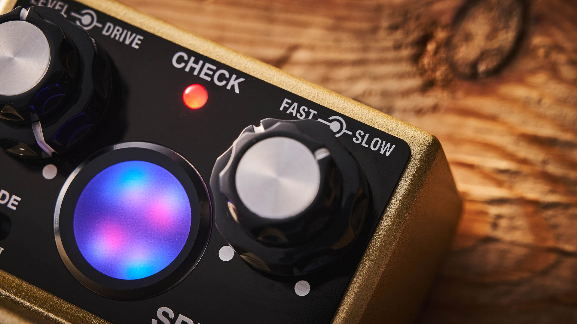 The Boss RT-2 Rotary Ensemble pictured in close-up against a wooden floor.
