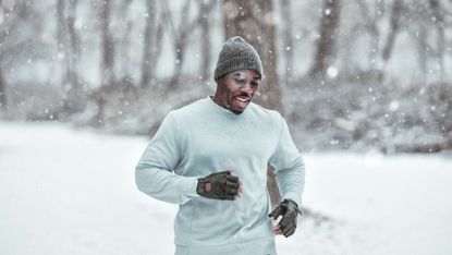 Man training in winter for weight loss