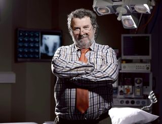 Paul Bradley as Elliot Hope in Holby City.