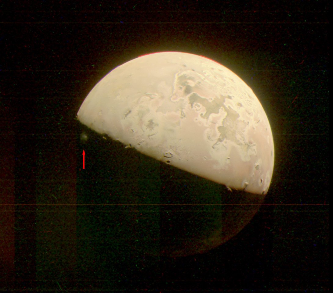 An image of Io taken by Juno shows volcanic material being ejected into the jovian moon's thin atmosphere