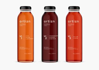 Three bottles of Artizn alcohol. With the flavours fig, pomegranate and plum.