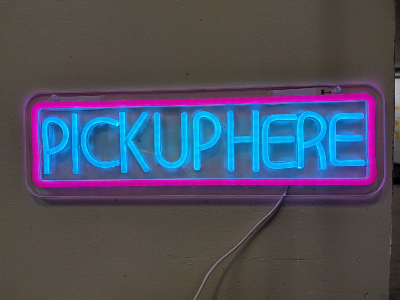 A dimly lit neon sign
