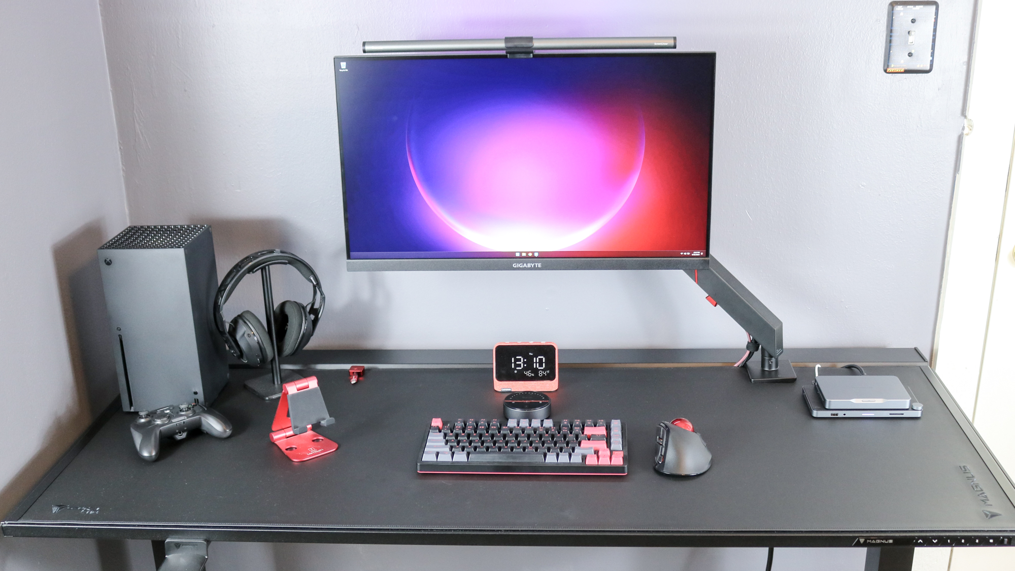 The Khadas Mind mini PC on the Secretlab Magnus Pro standing desk