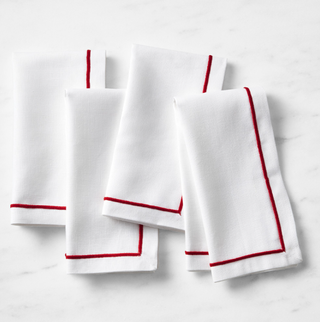 red trim dinner napkin