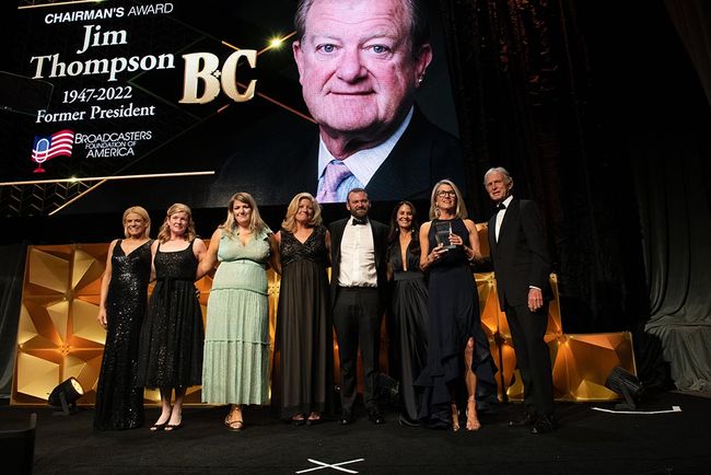 Cindy Thompson, wife of the late Broadcasters Foundation of America president Jim Thompson, and family accept the Chairman&rsquo;s Award on his behalf.