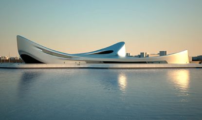 Curved building pictured across the water