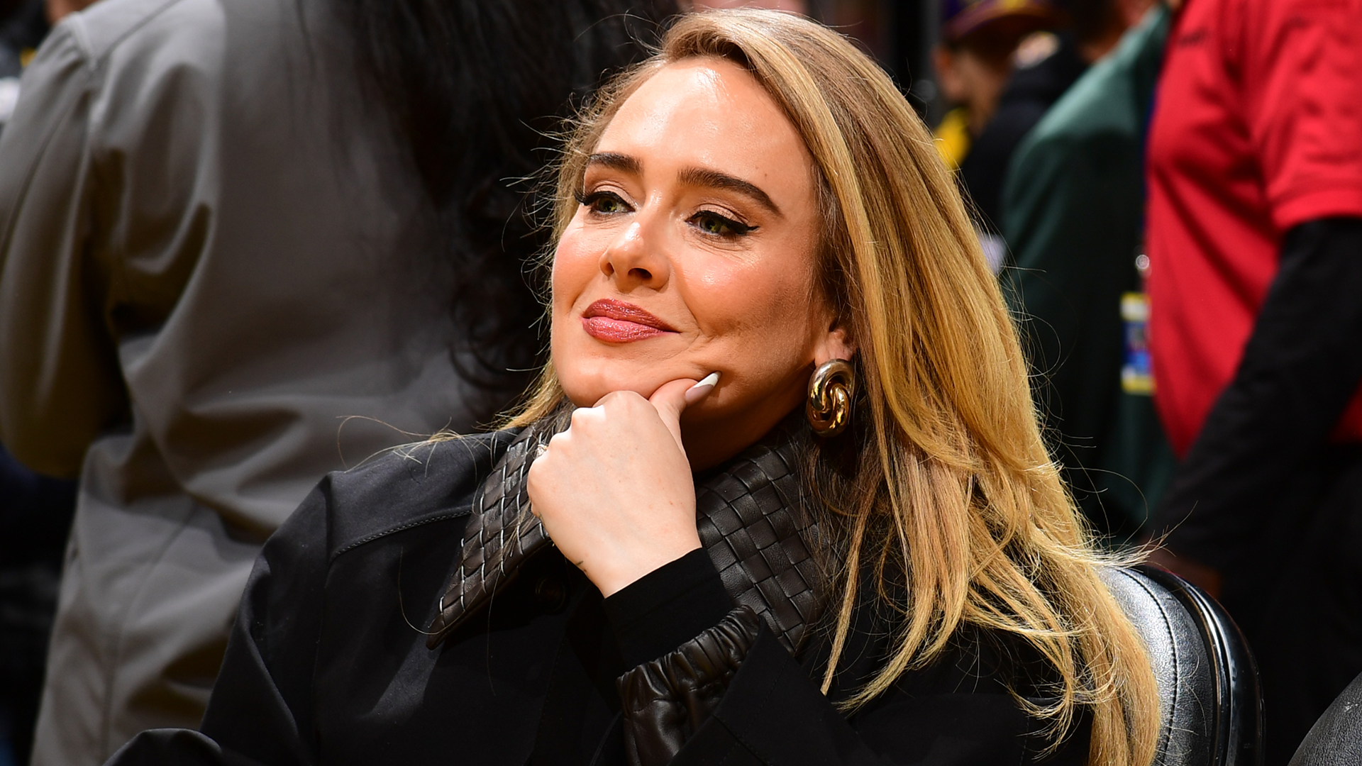 Adele made a surprise appearance in a dark-wash barrel jeans outfit for spring