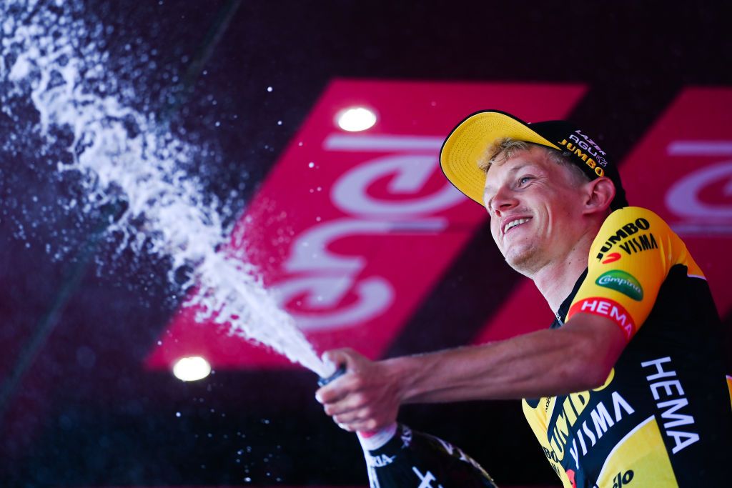 POTENZA ITALY MAY 13 Koen Bouwman of Netherlands and Team Jumbo Visma celebrates winning the stage on the podium ceremony after the 105th Giro dItalia 2022 Stage 7 a 196km stage from Diamante to Potenza 717m Giro WorldTour on May 13 2022 in Potenza Italy Photo by Tim de WaeleGetty Images