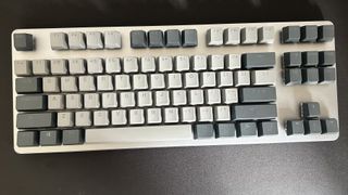 Drop CTRL keyboard on a matte black background