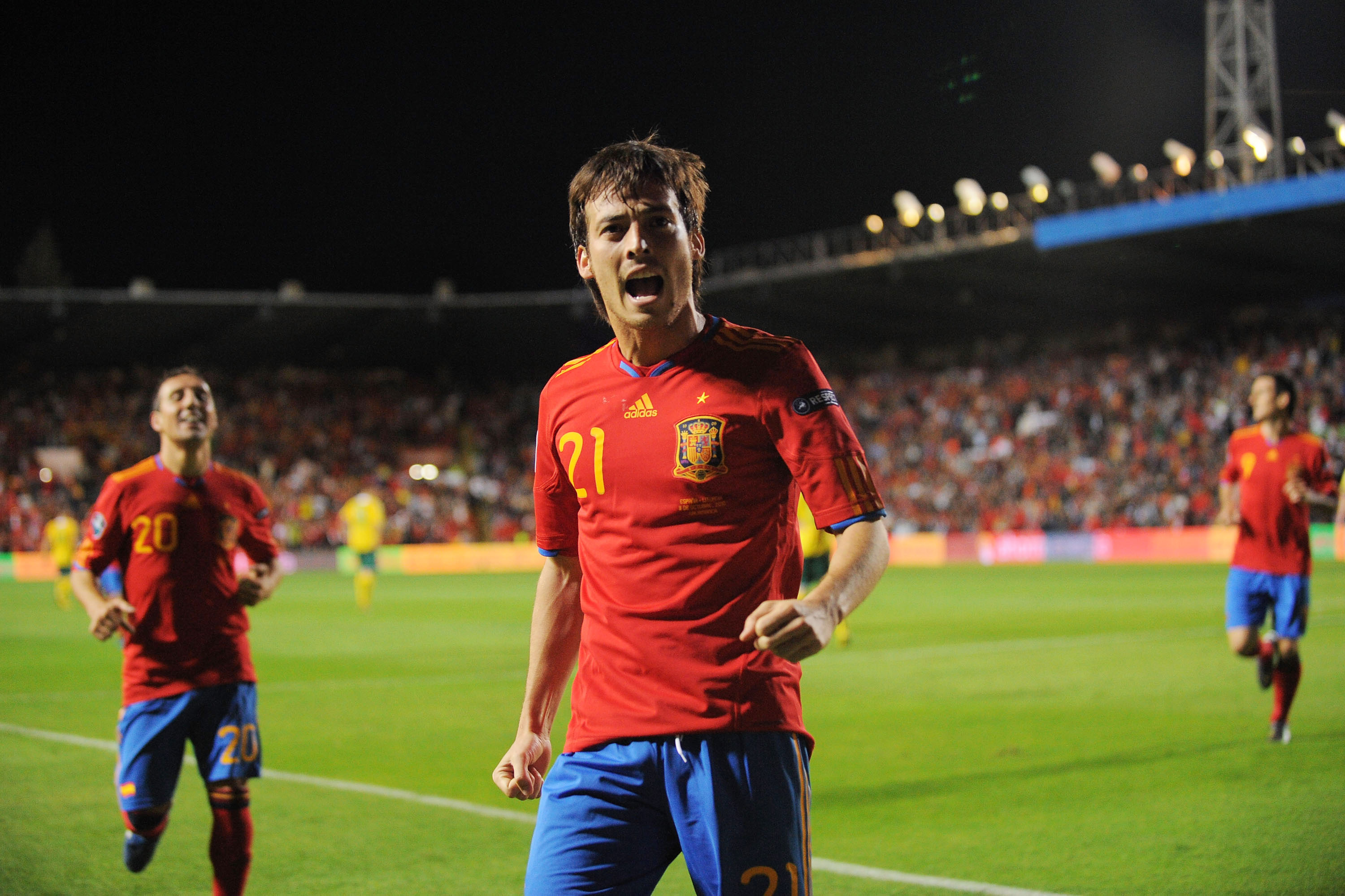 David Silva celebrates after scoring for Spain against Lithuania in 2010.