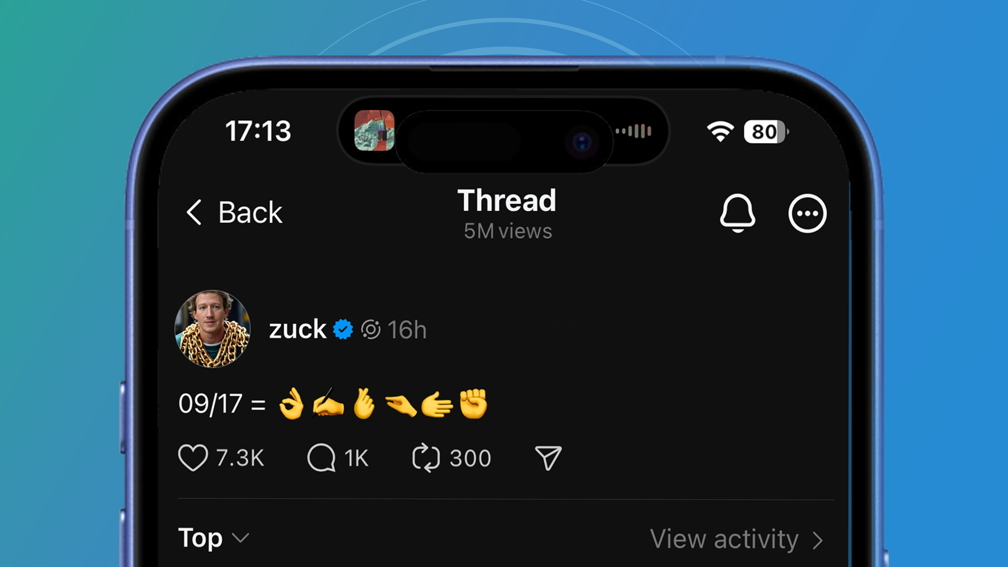 A phone on a green and blue background showing a Threads post from Mark Zuckerberg with hand emojis